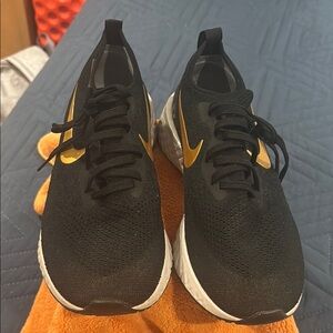 Black Sneakers with Gold Accents
